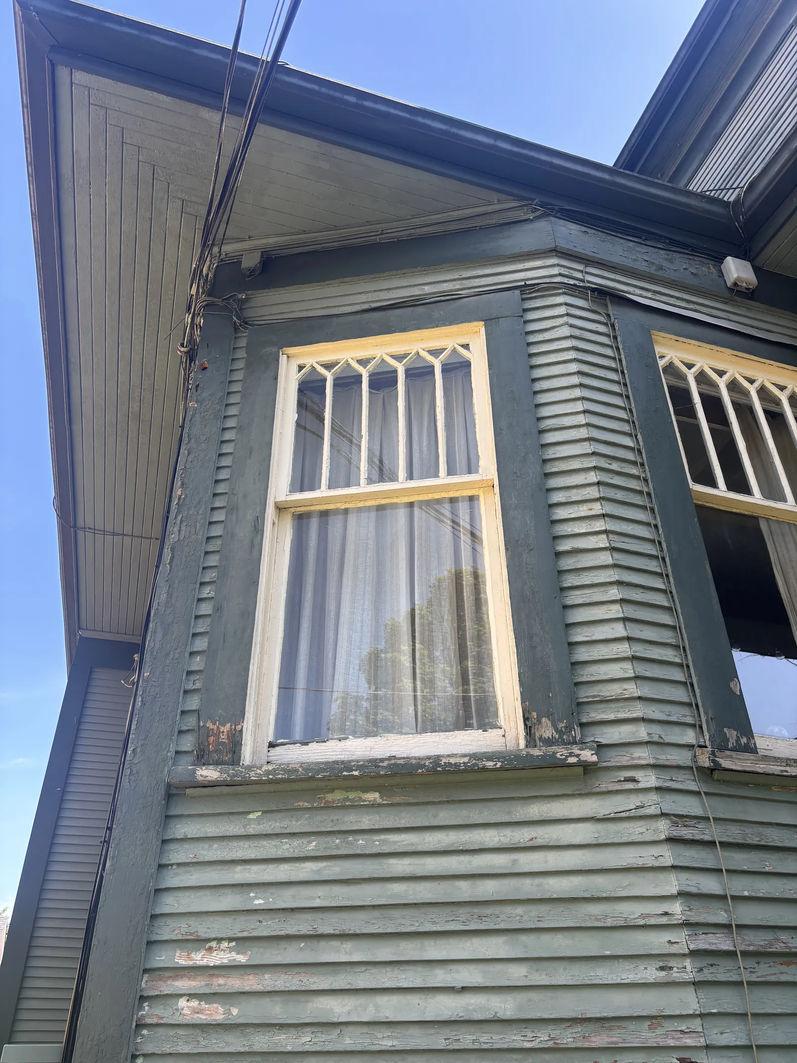 Before — East Vancouver heritage home siding condition