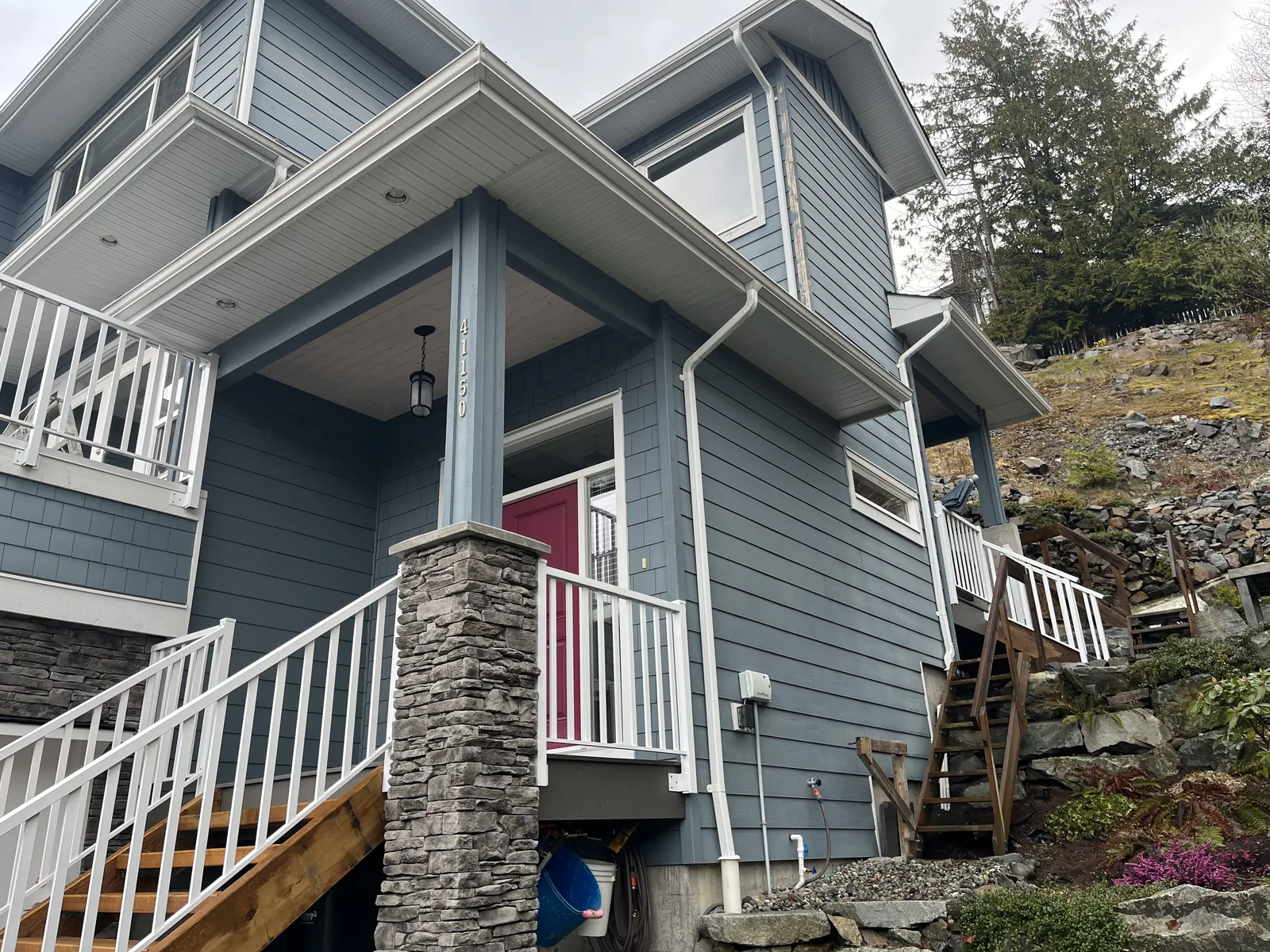 Garibaldi Highlands 4-storey colour match — boom lift and crew