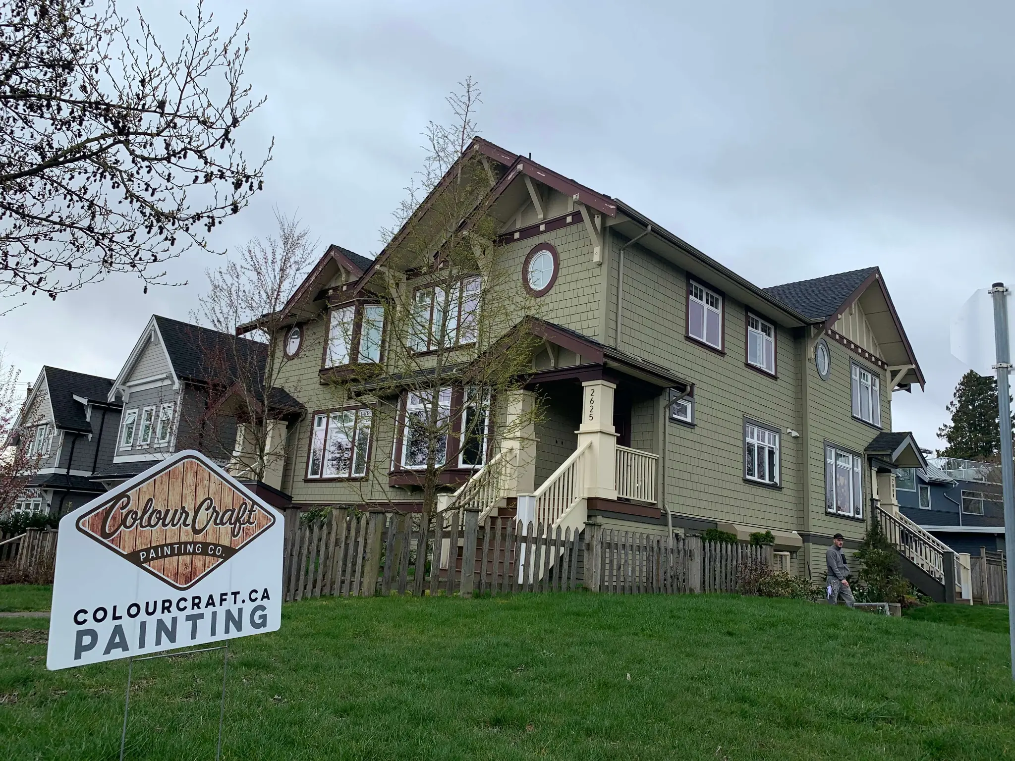 Colour Craft Painting project sign in front of freshly painted home
