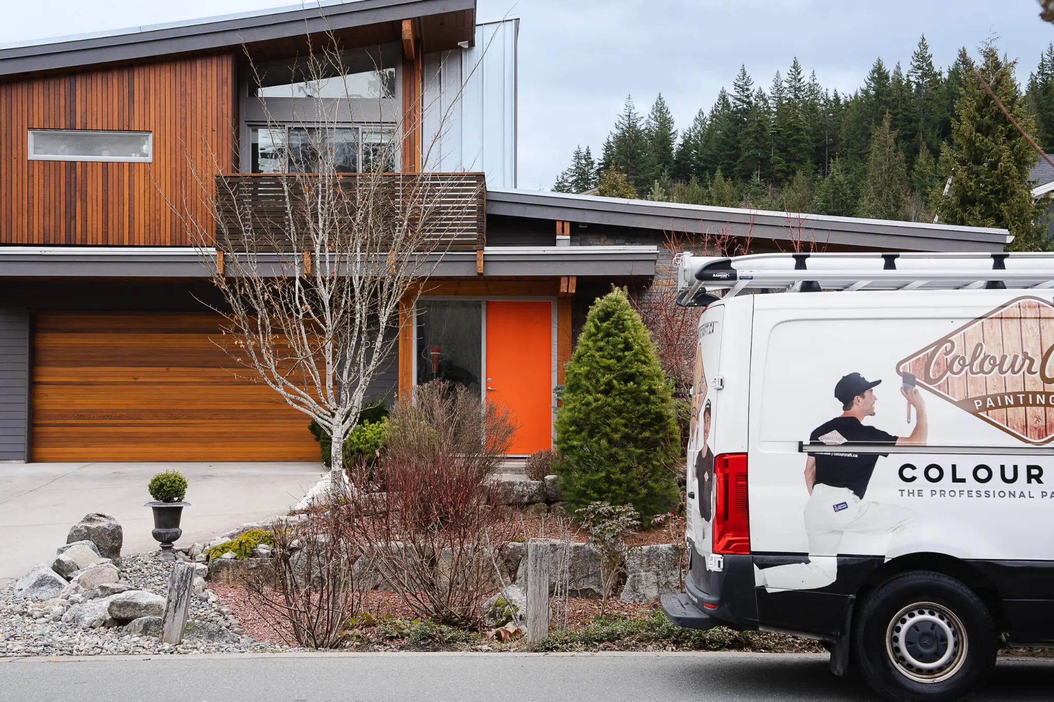 Colour Craft Painting van parked in front of modern home