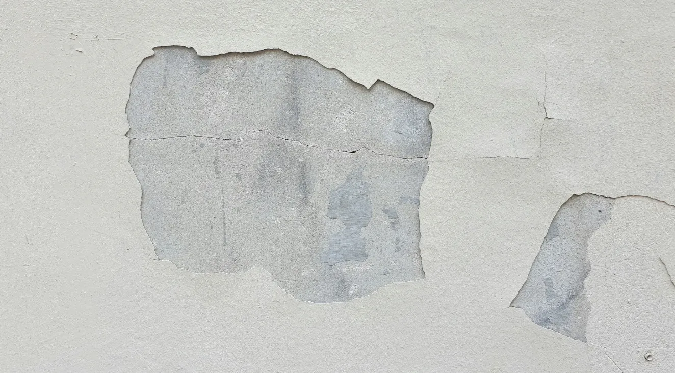 Drywall repair — wall surface damage ready for repair by Colour Craft Painting