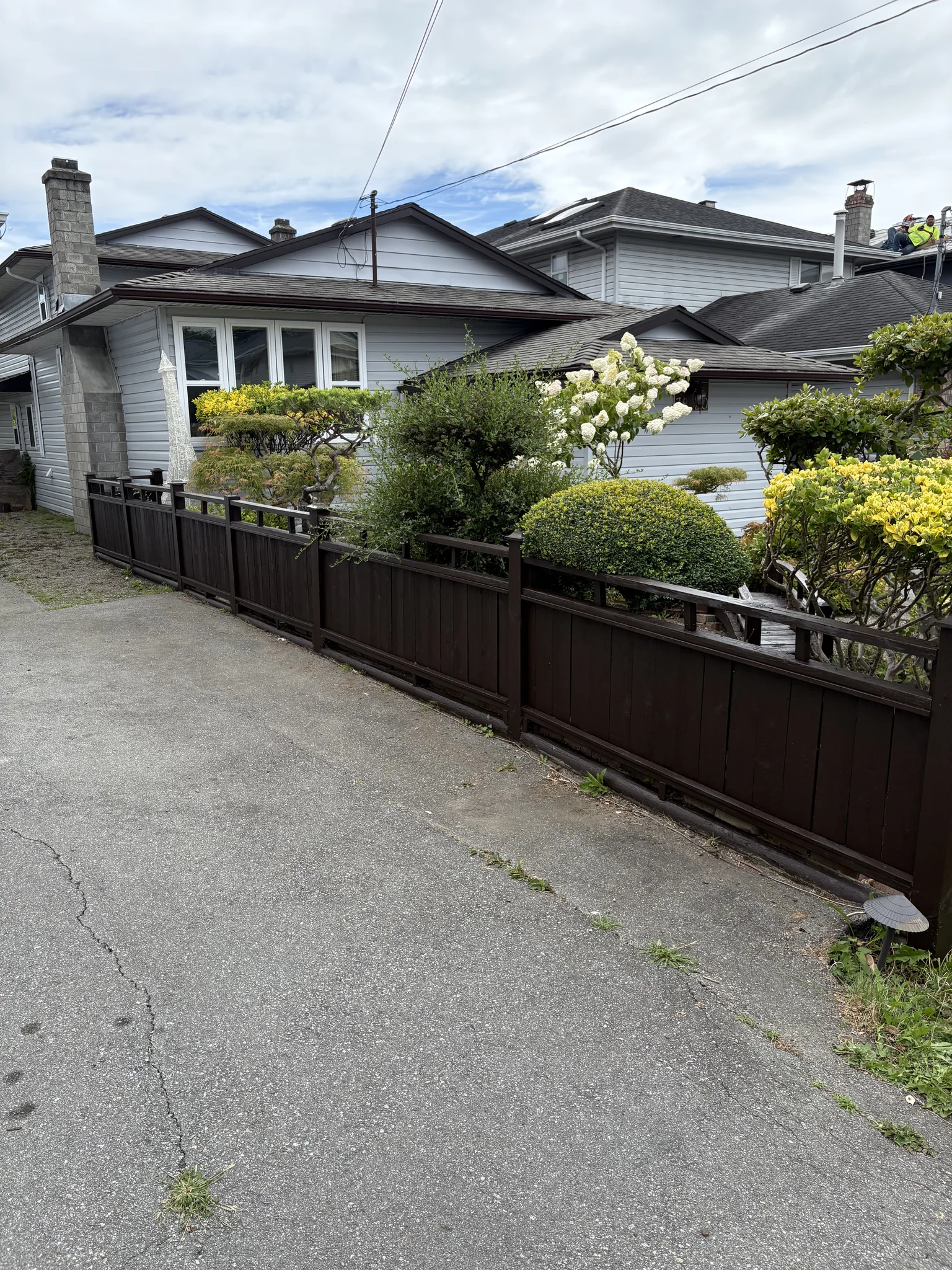 After exterior trim colour-match detail at a Steveston home in Richmond, BC