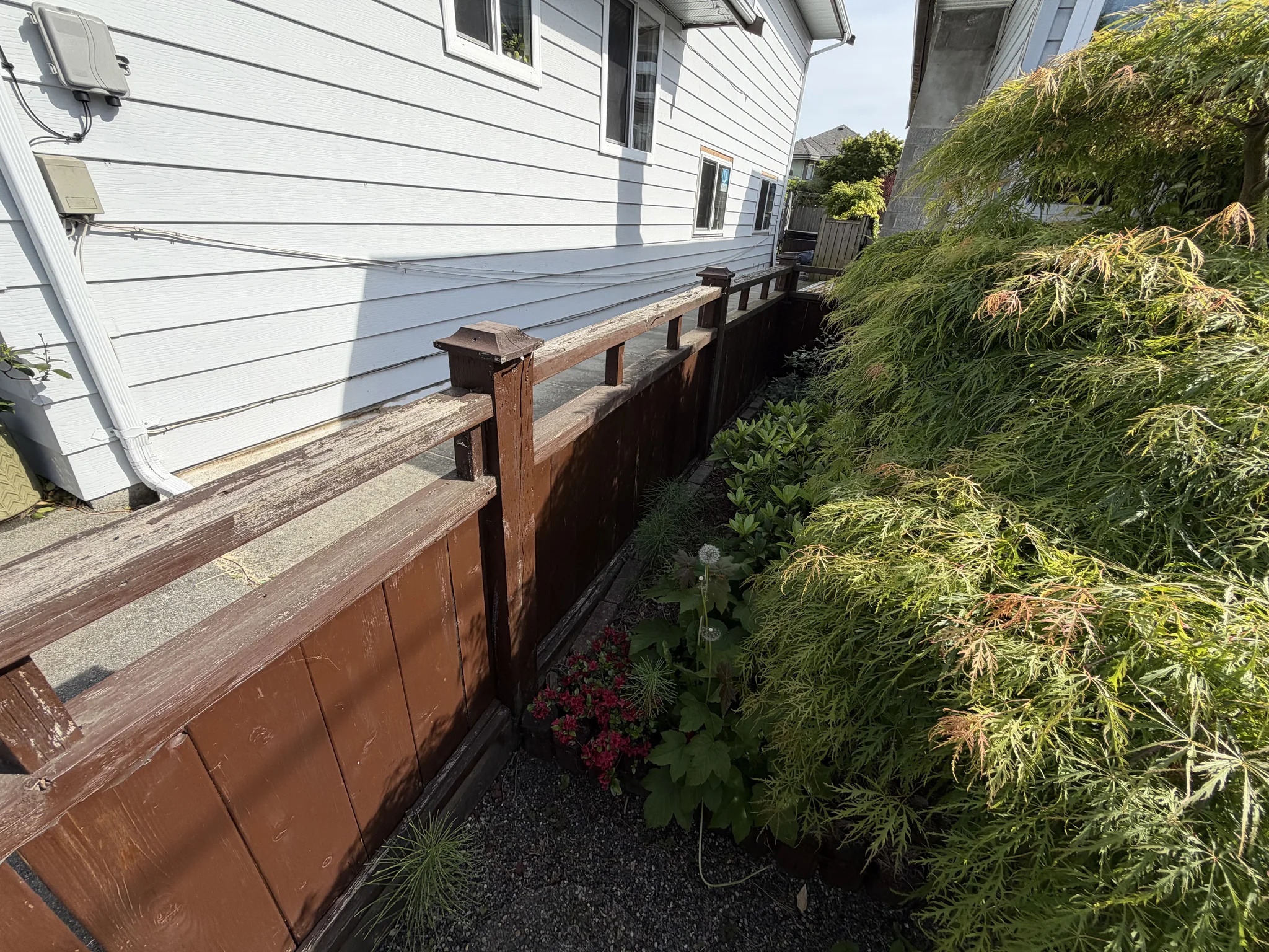 Before trim and siding detail at a Steveston home in Richmond, BC
