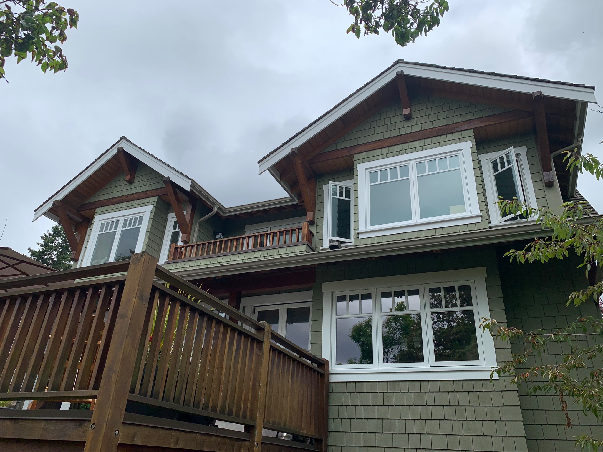 Completed stain restoration, full North Vancouver home exterior view
