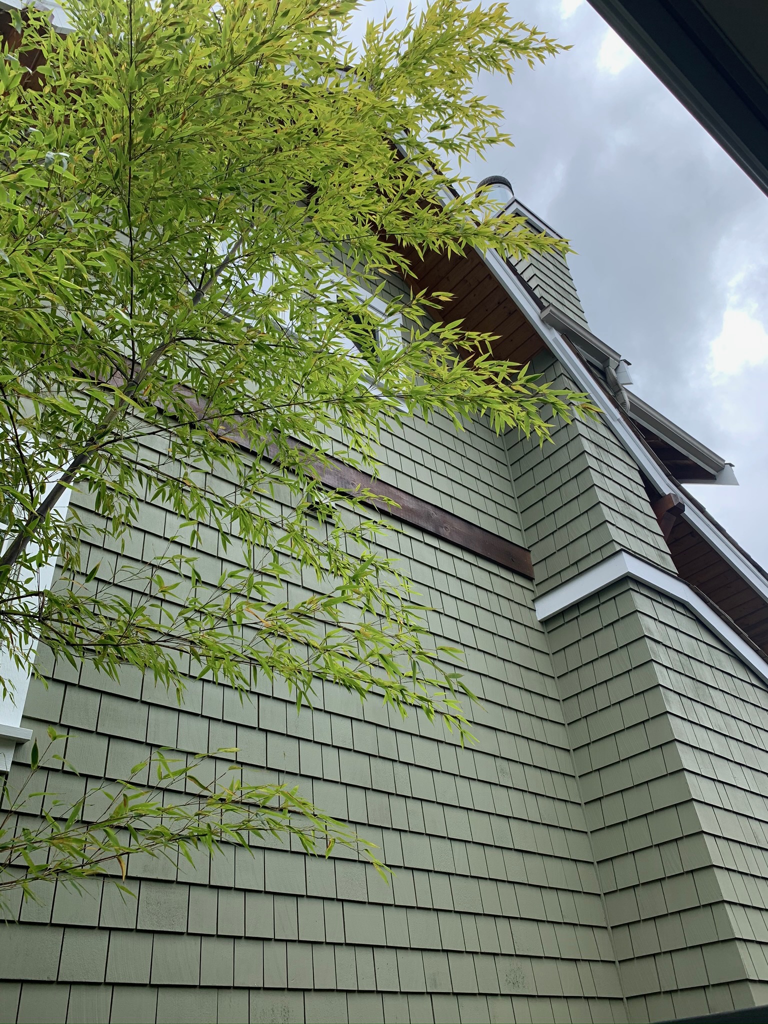 Completed siding and trim stain restoration at James’s North Vancouver home