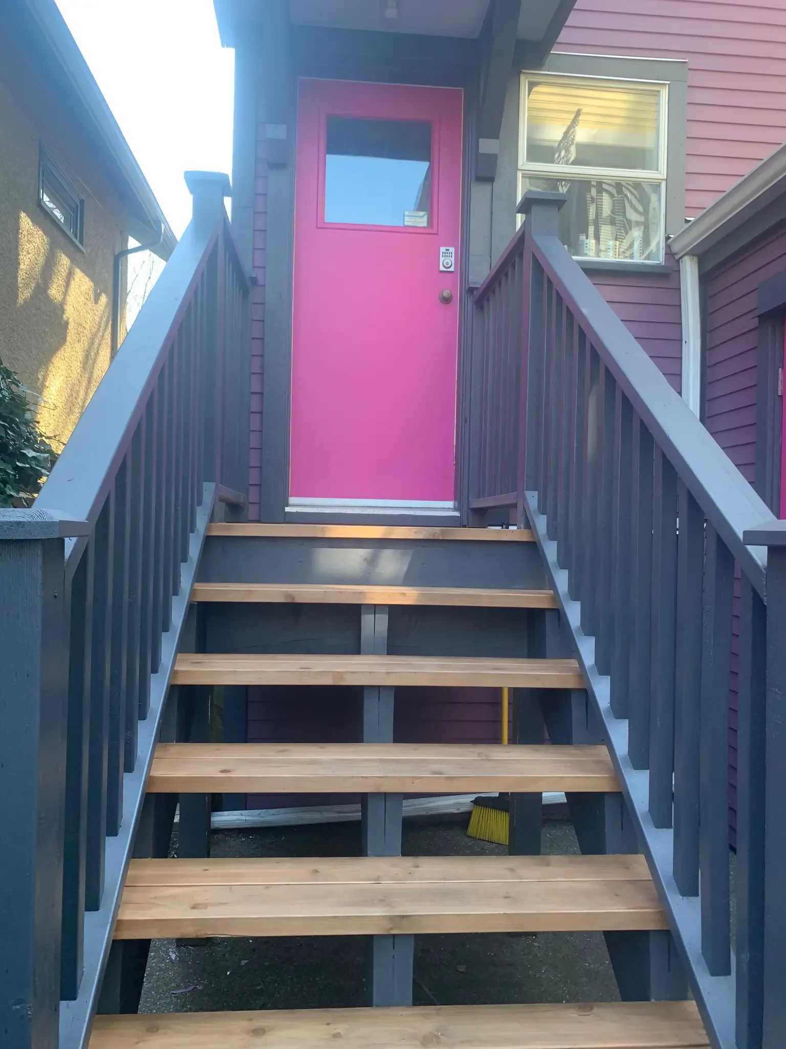 After — Upper storey detail with purple siding, East Vancouver
