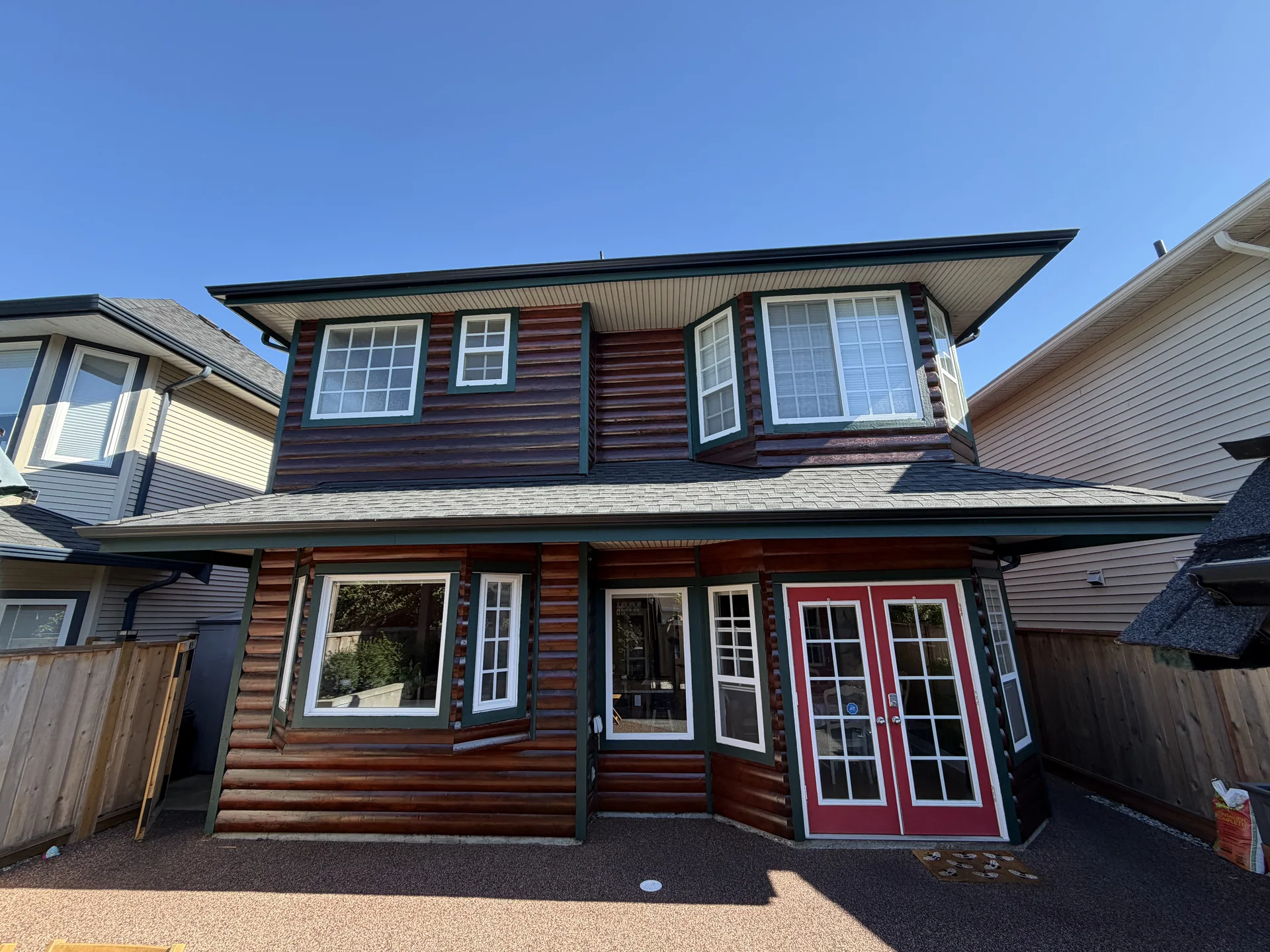 Completed log siding and trim detail in Steveston Richmond BC