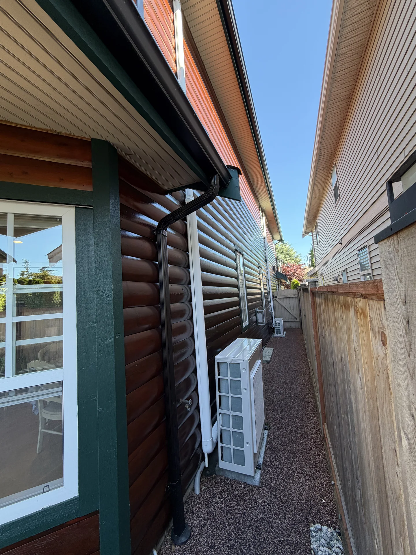 Completed exterior log siding finish in Steveston Richmond BC