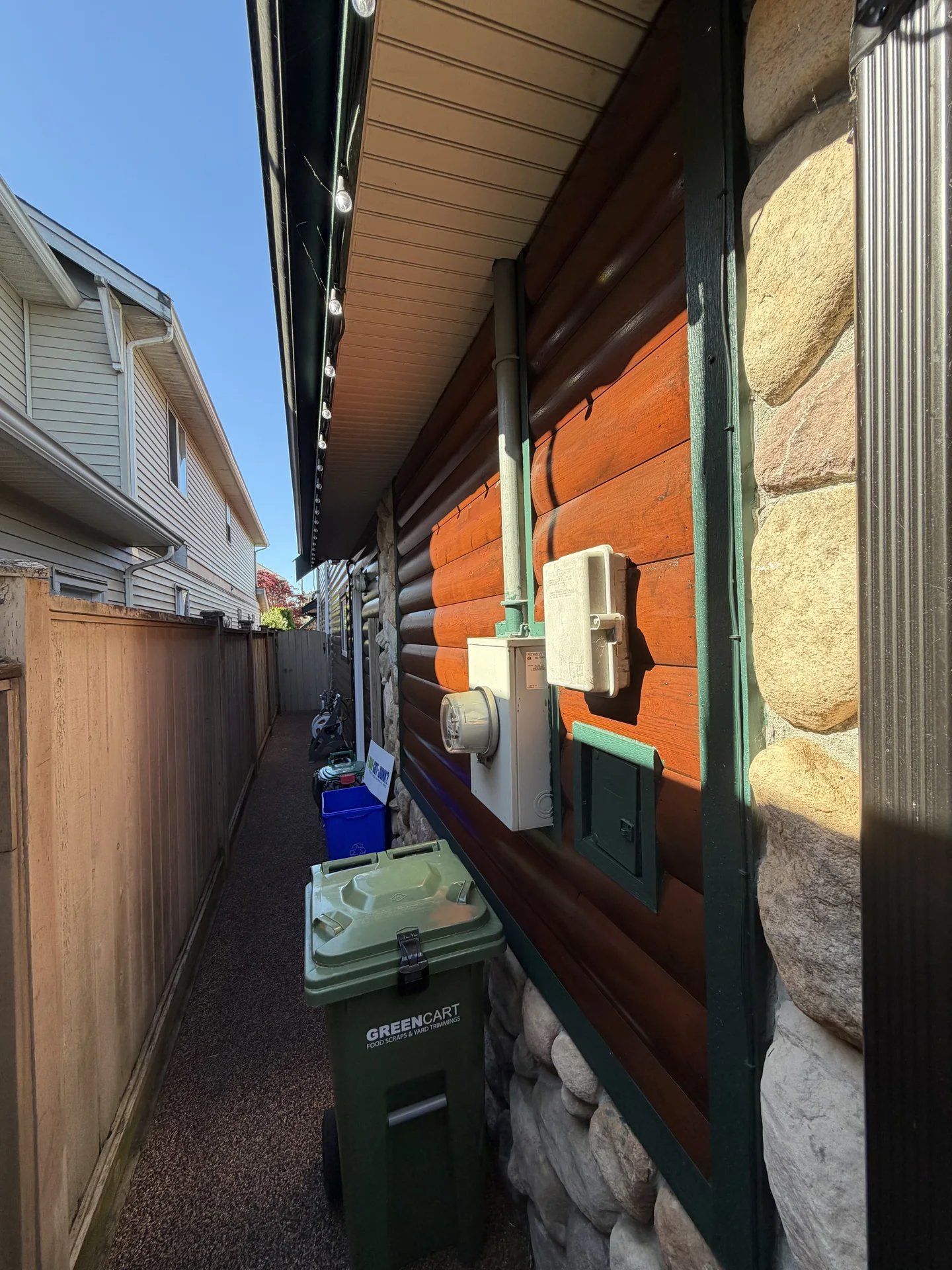Completed exterior log siding finish in Steveston Richmond BC