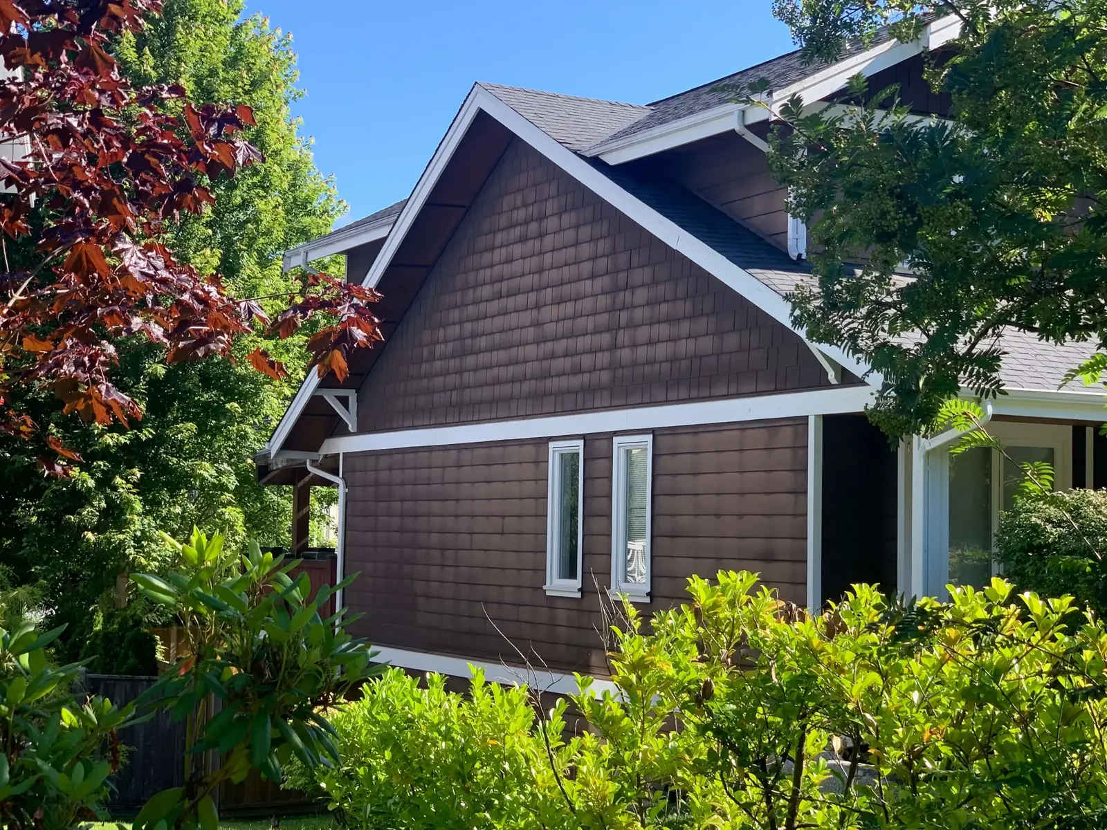 Before — Matt residence side view, Garibaldi Highlands Squamish BC — original siding condition