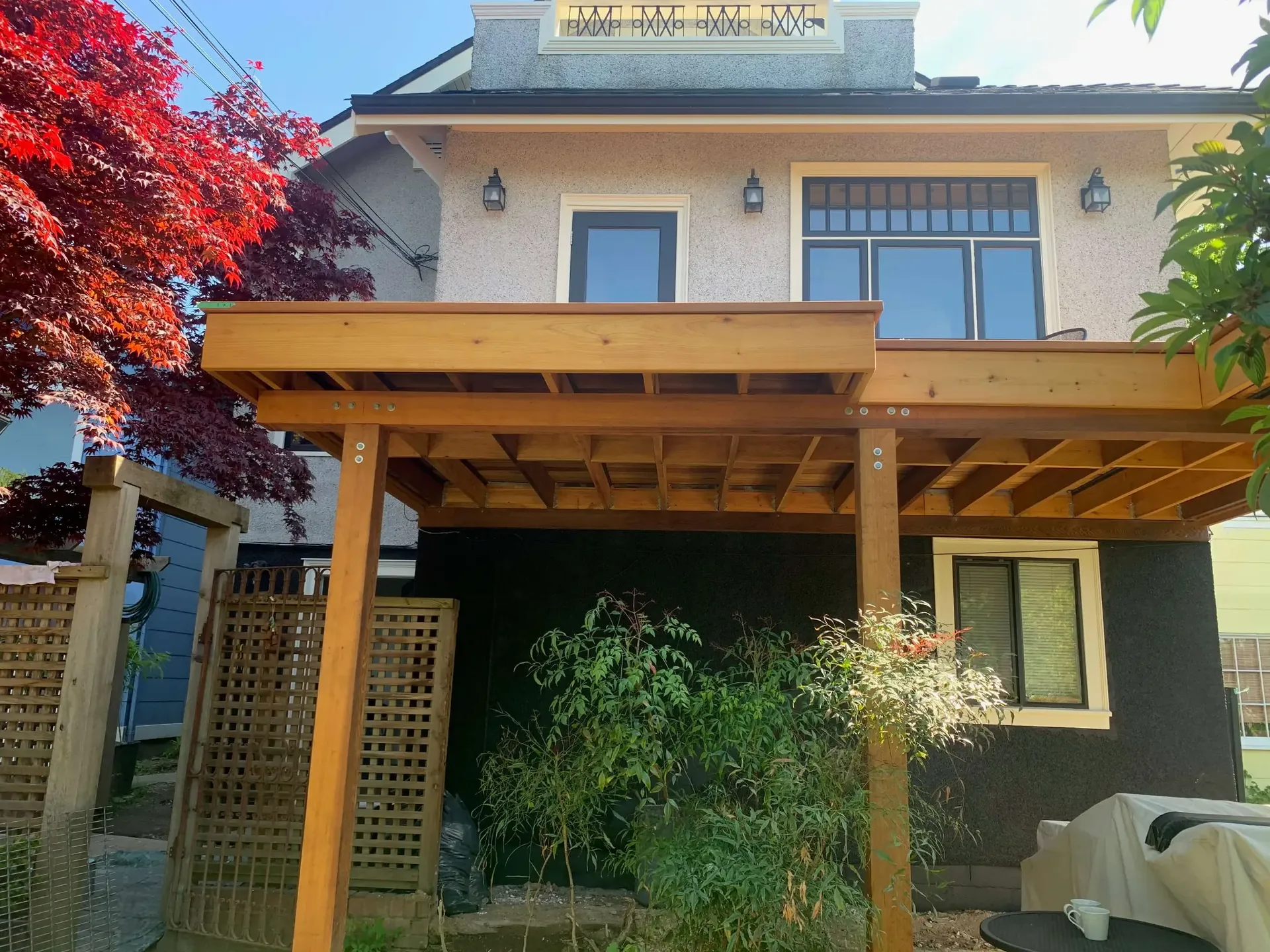 Side view after stucco repaint — charcoal stucco Mount Pleasant East Vancouver