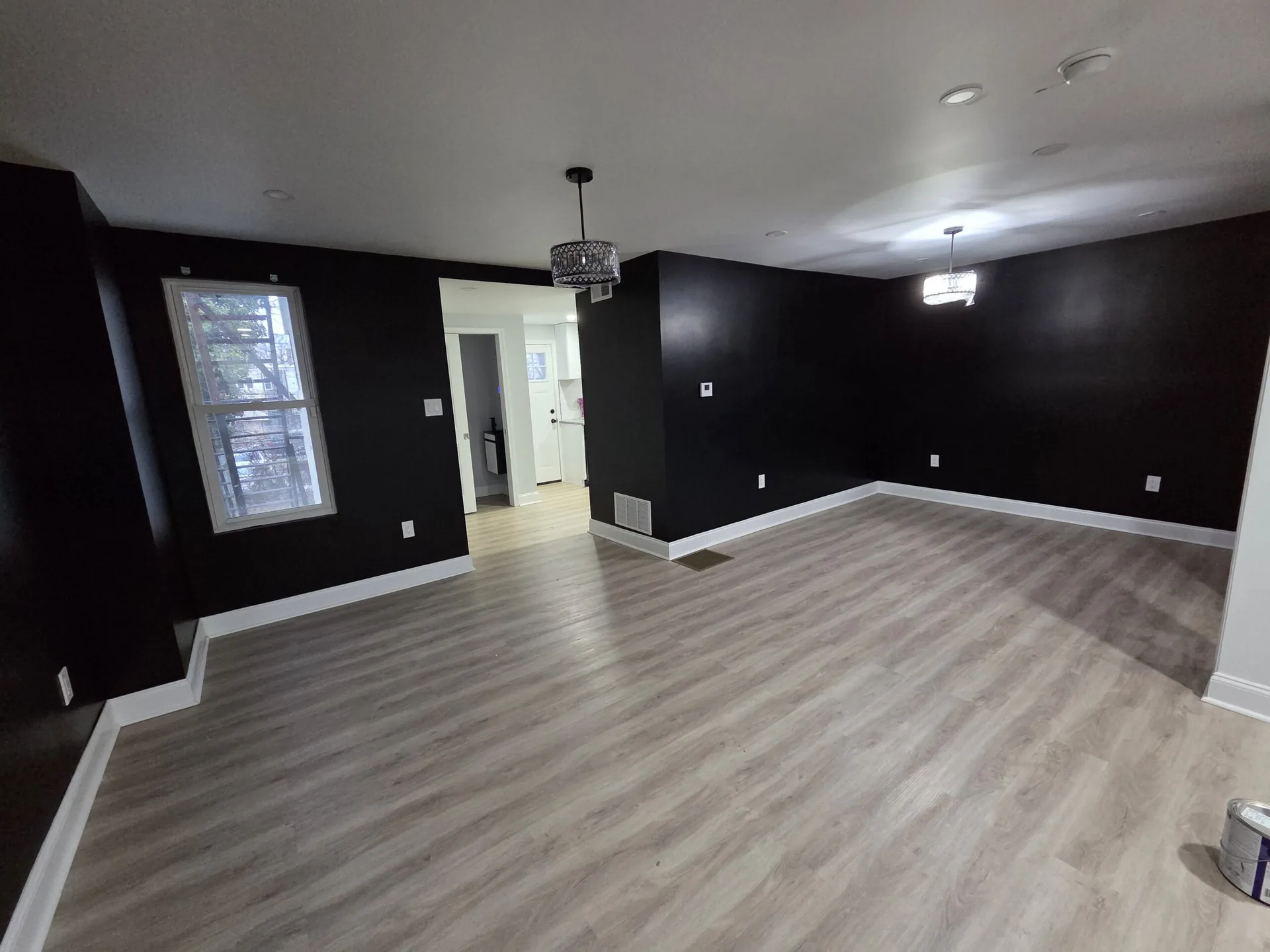 Bedroom after interior painting — black walls Philadelphia PA