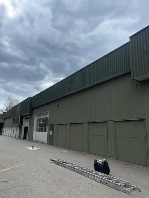 Warehouse exterior painting Squamish BC — high access work