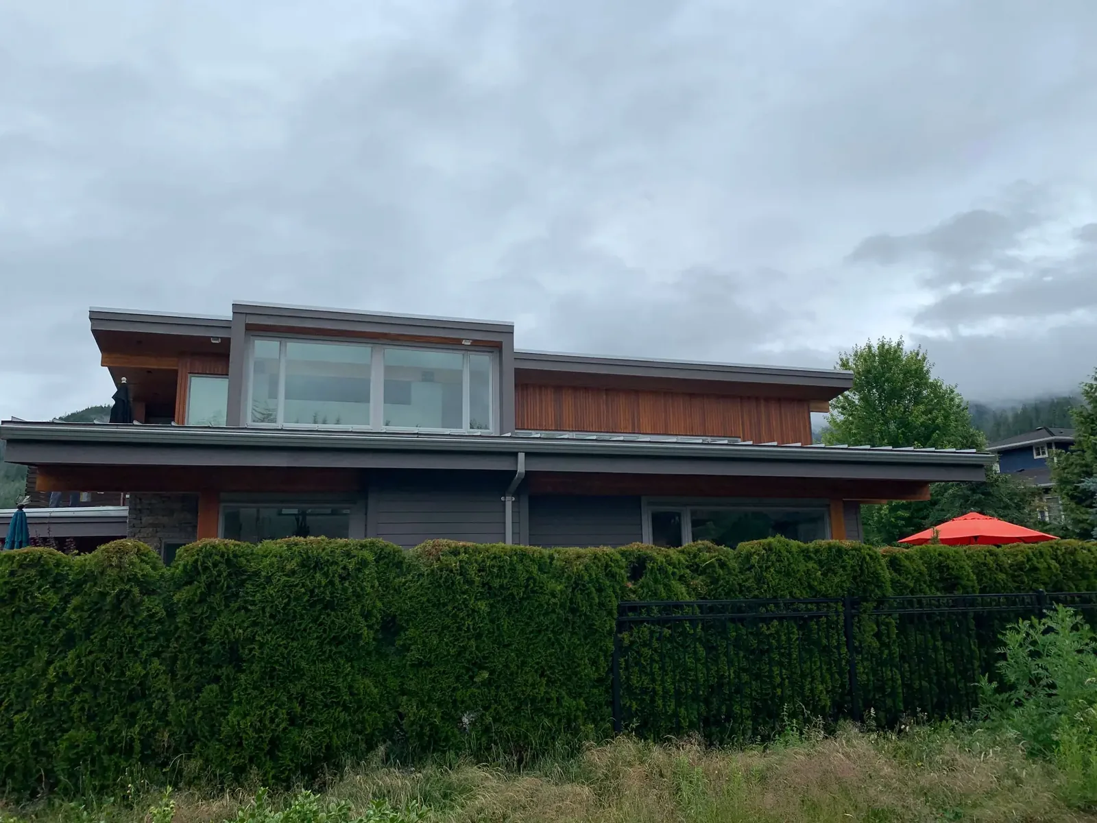 After — Cedar siding restoration front view, Sikkens Cetol 1 stain, Squamish BC