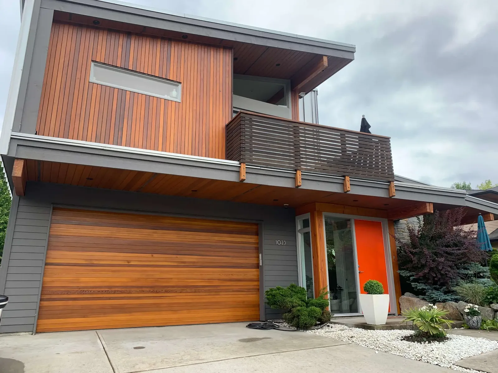 After — Cedar soffit and beam with amber stain, Squamish BC