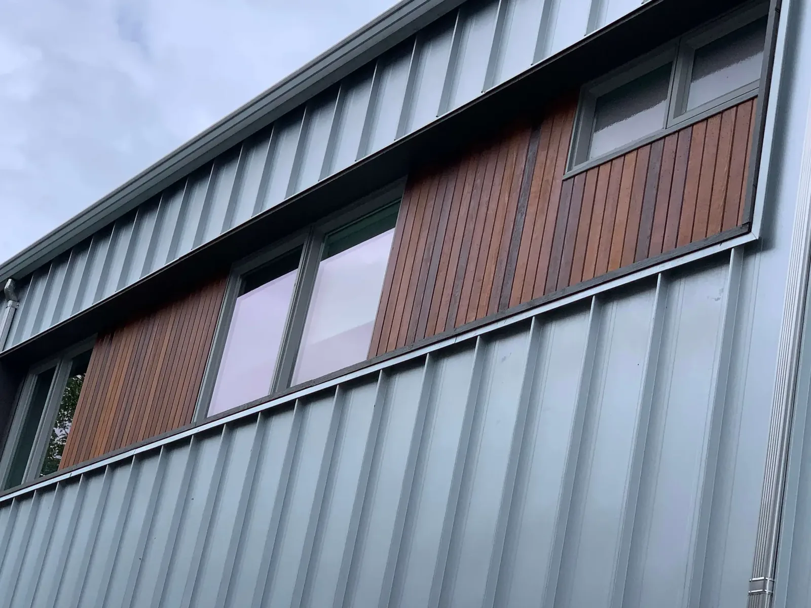 After — Cedar siding detail, Sikkens amber stain, Squamish BC