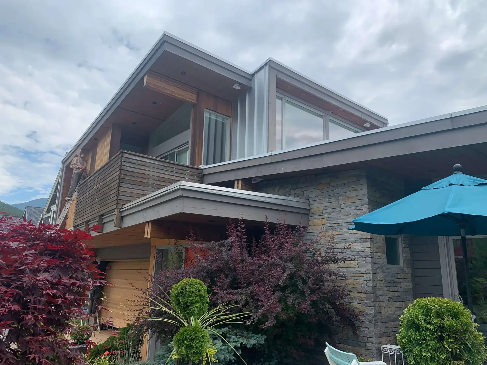 Before — Cedar wood restoration back view, Squamish BC mountain backdrop