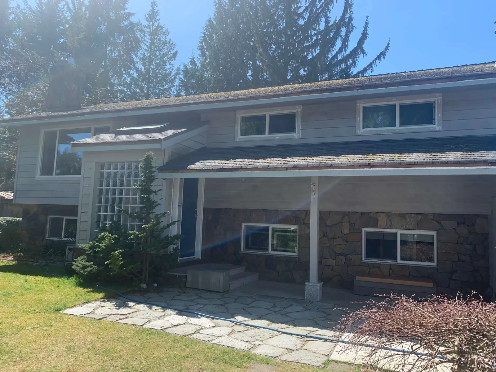 Before — Yves residence front view, Garibaldi Highlands Squamish — original grey siding