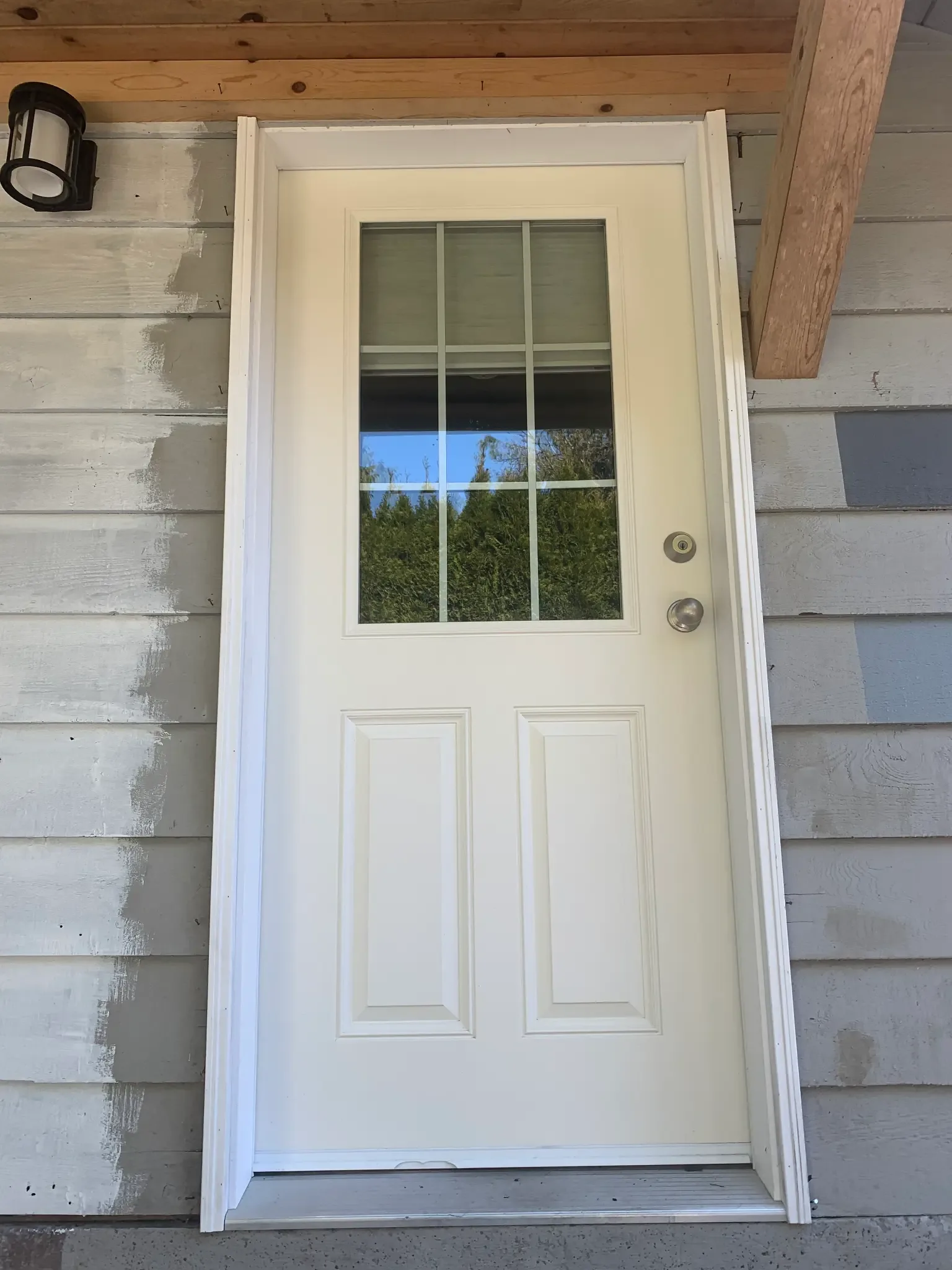 Before — Yves residence door primer stage, Garibaldi Highlands Squamish