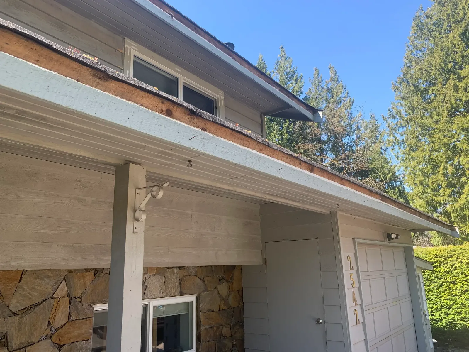 Before — Yves residence fascia and upper siding, Garibaldi Highlands Squamish