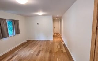 Interior house painting services, stained wooden floors white walls and ceiling, types of paint finishes