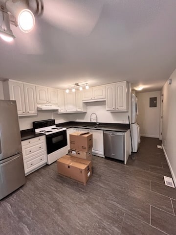 Interior house painting services, white walls, cabinets, and ceiling